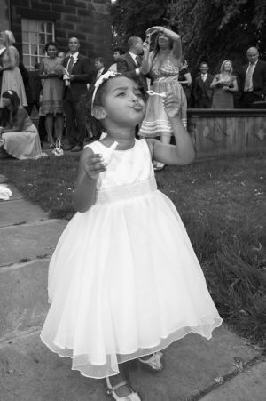 Reportage Style Wedding Photography of a Bridesmaid at the Church